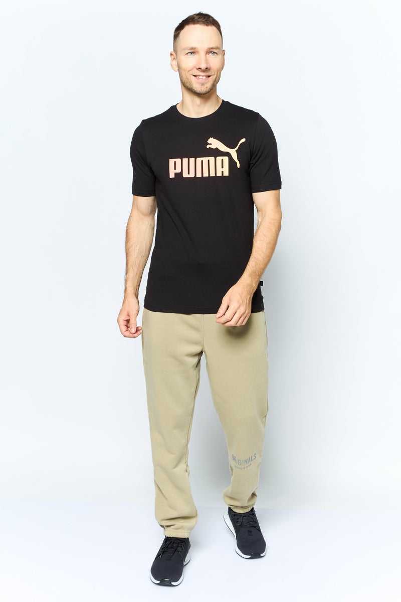 PUMA Men Sportswear Fit Short Sleeves Brand Logo Outdoor T-Shirt, Black - Image 4